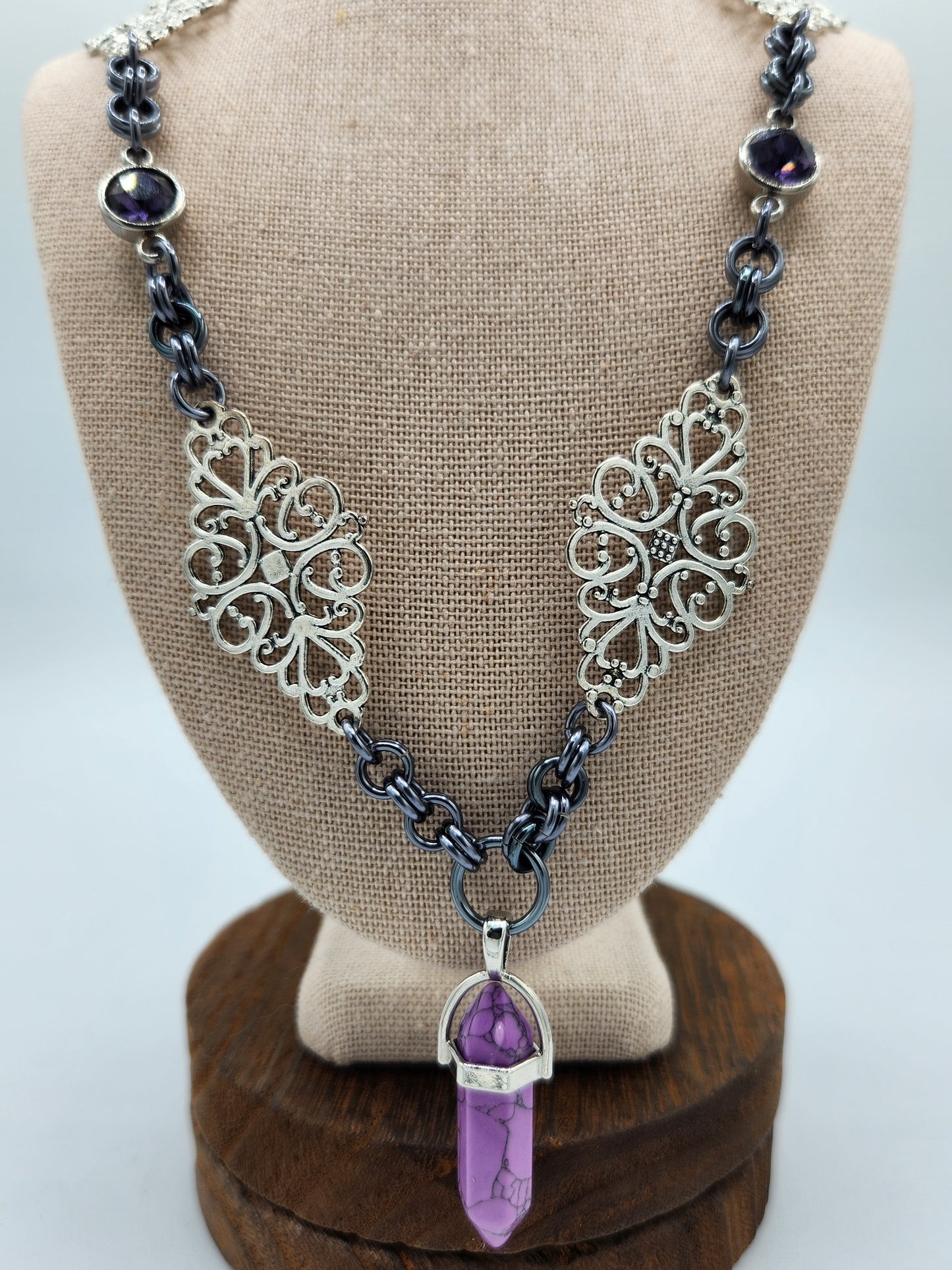 Silver Necklace with Purple Glass Accents and Pendant