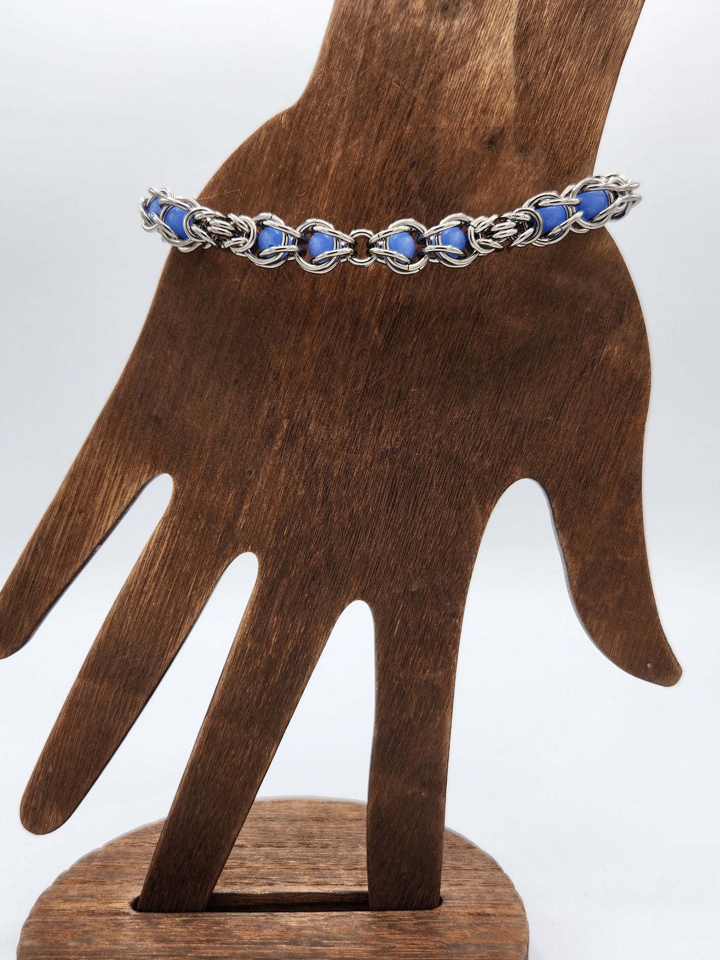 Stainless Steel and Captured Blue Glow Bead Bracelet