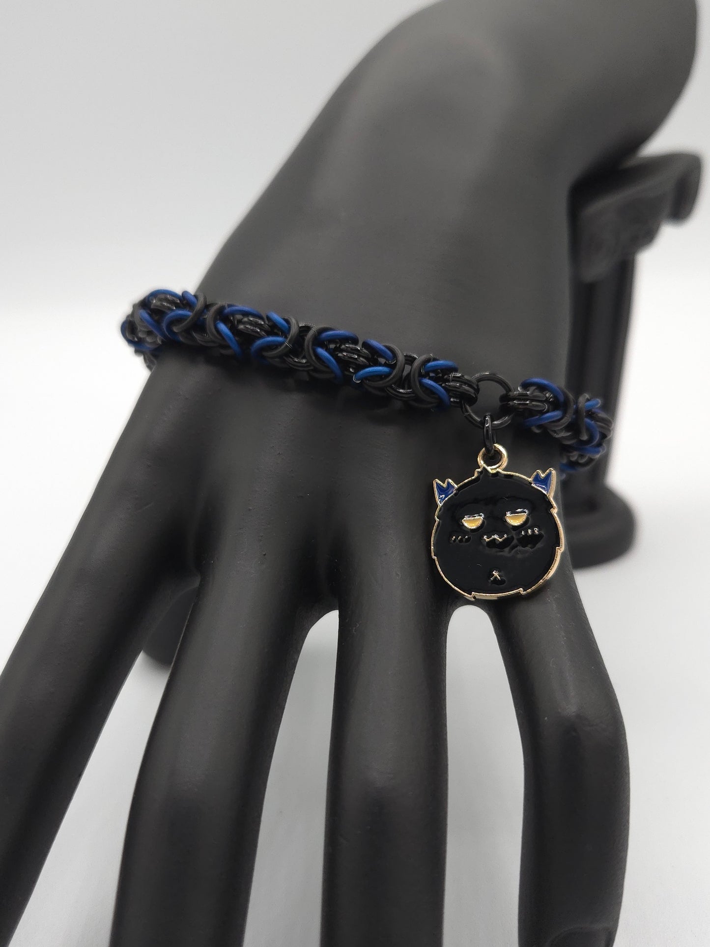 Black, Matte Black, and Matte Blue Byzantine Bracelet with a Sooty Puff Charm