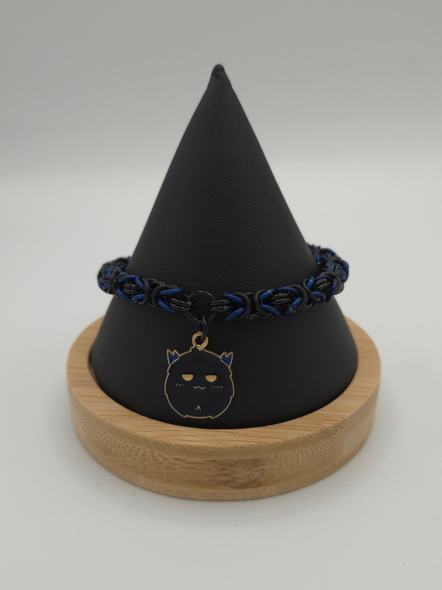 Black, Matte Black, and Matte Blue Byzantine Bracelet with a Sooty Puff Charm