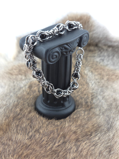 Stainless Steel and Captured Black Bead Bracelet