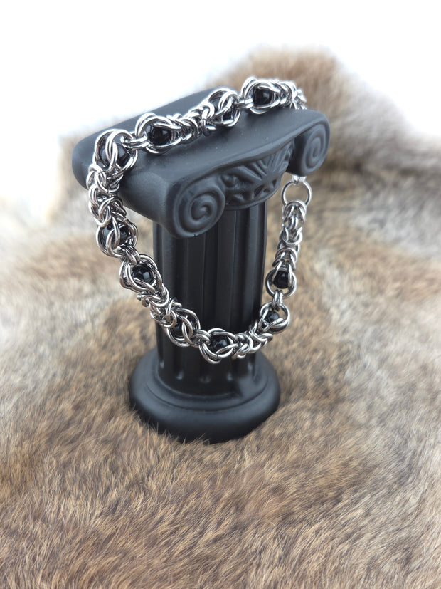 Stainless Steel and Captured Black Bead Bracelet