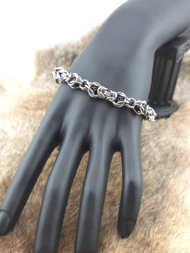 Stainless Steel and Captured Black Bead Bracelet
