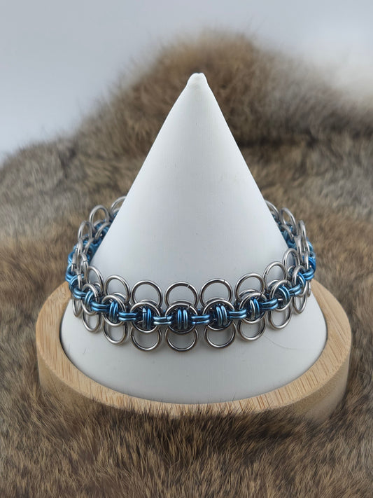 Stainless Steel and Light Blue Titanium Celtic Wings Bracelet