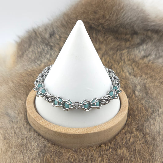 Captured Bead Bracelet - Stainless Steel with Captured Teal Glow Beads