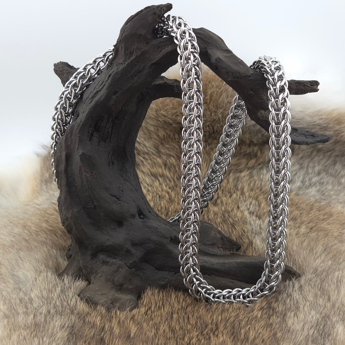 A stainless steel Full Persian necklace in 18g rings.
