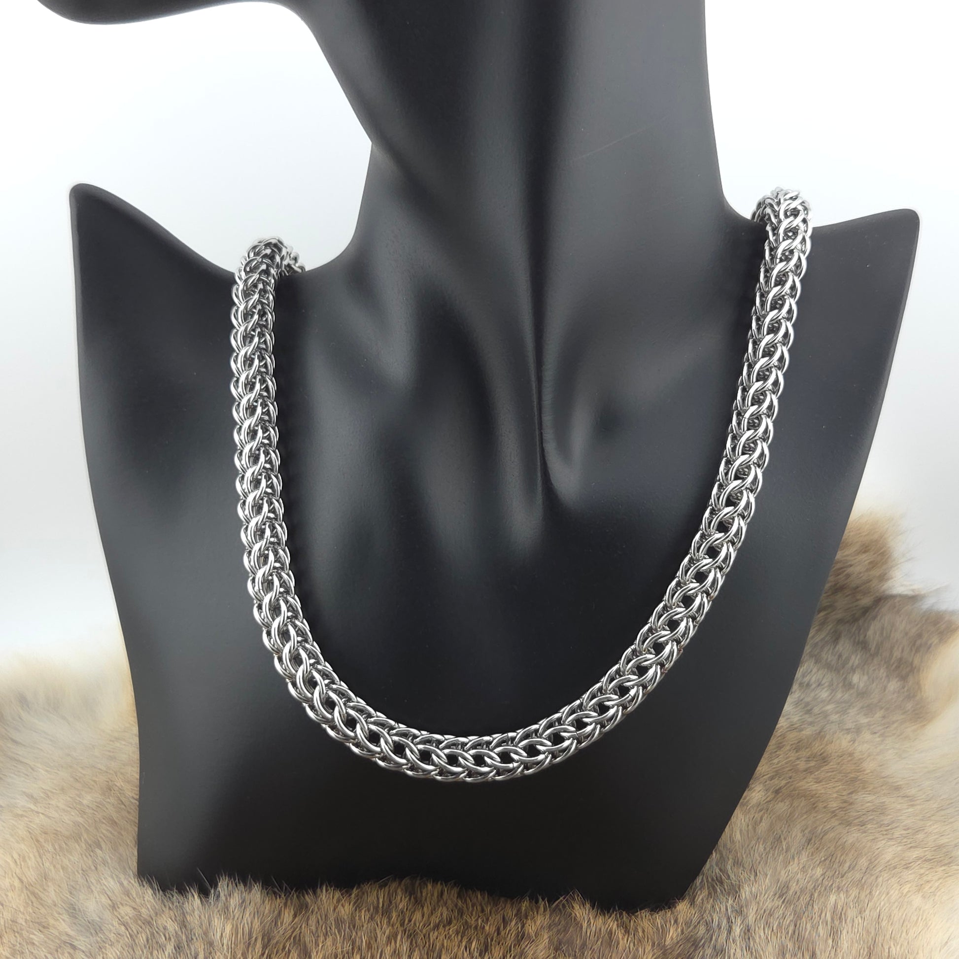 A stainless steel Full Persian necklace in 18g rings.