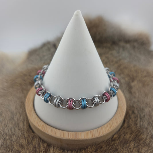 Barrel weave chainmail bracelet, woven with transgender pride flag colors on stainless steel.