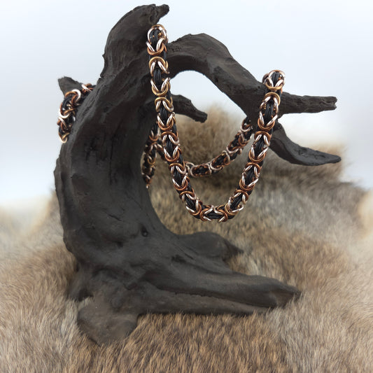 Byzantine chainmail necklace handwoven in matte black, bronze, and rose gold premium anodized aluminum.