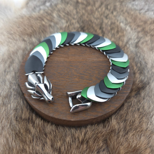 Dragon Scale Bracelet in Agender Pride Flag colors, handwoven with a stainless steel spine and solid stainless steel clasp, with premium aluminum anodized scales.