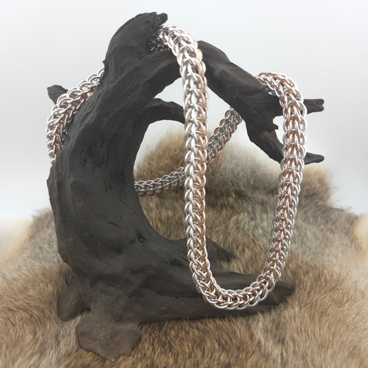 A silver and rose gold Full Persian chainmail necklace. Handmade with premium anodized aluminum.