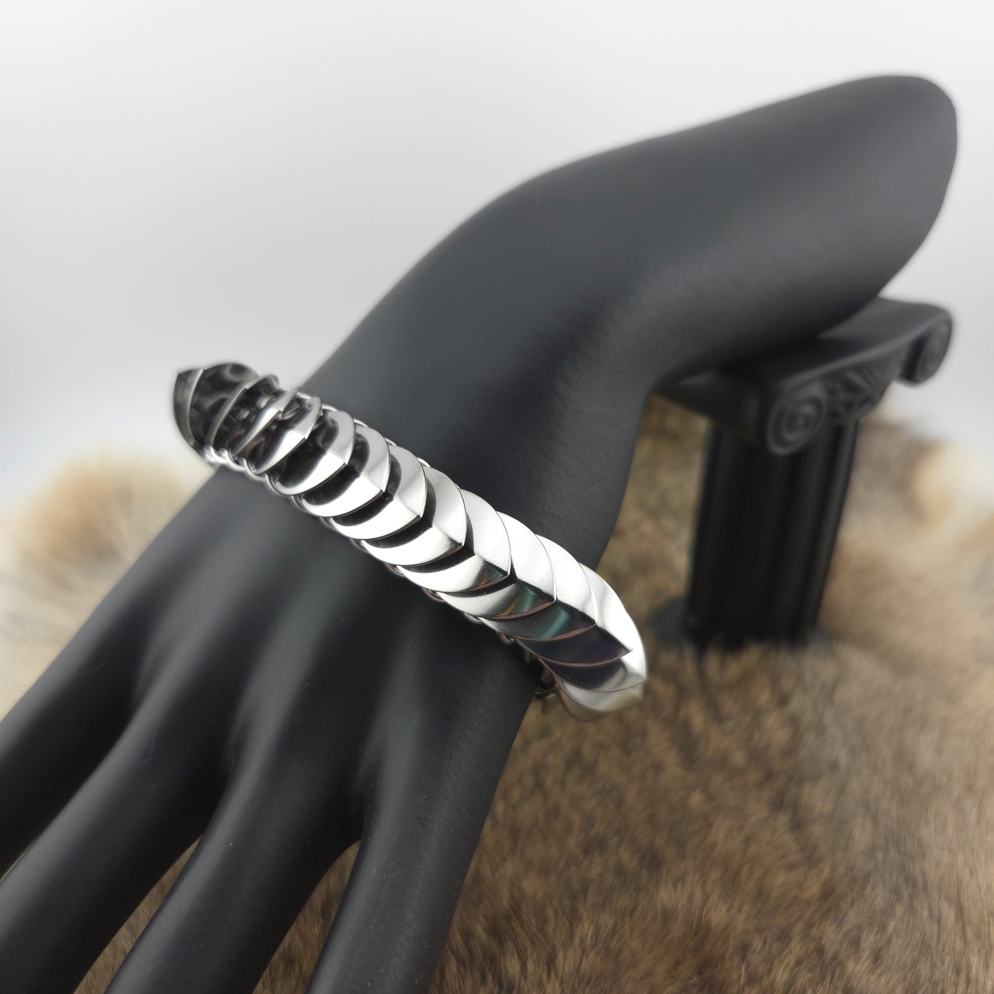 Stainless steel Dragon Scale Bracelet, with a stainless steel spine, stainless steel scales, and a solid stainless steel spring clasp shaped as a Dragon head.