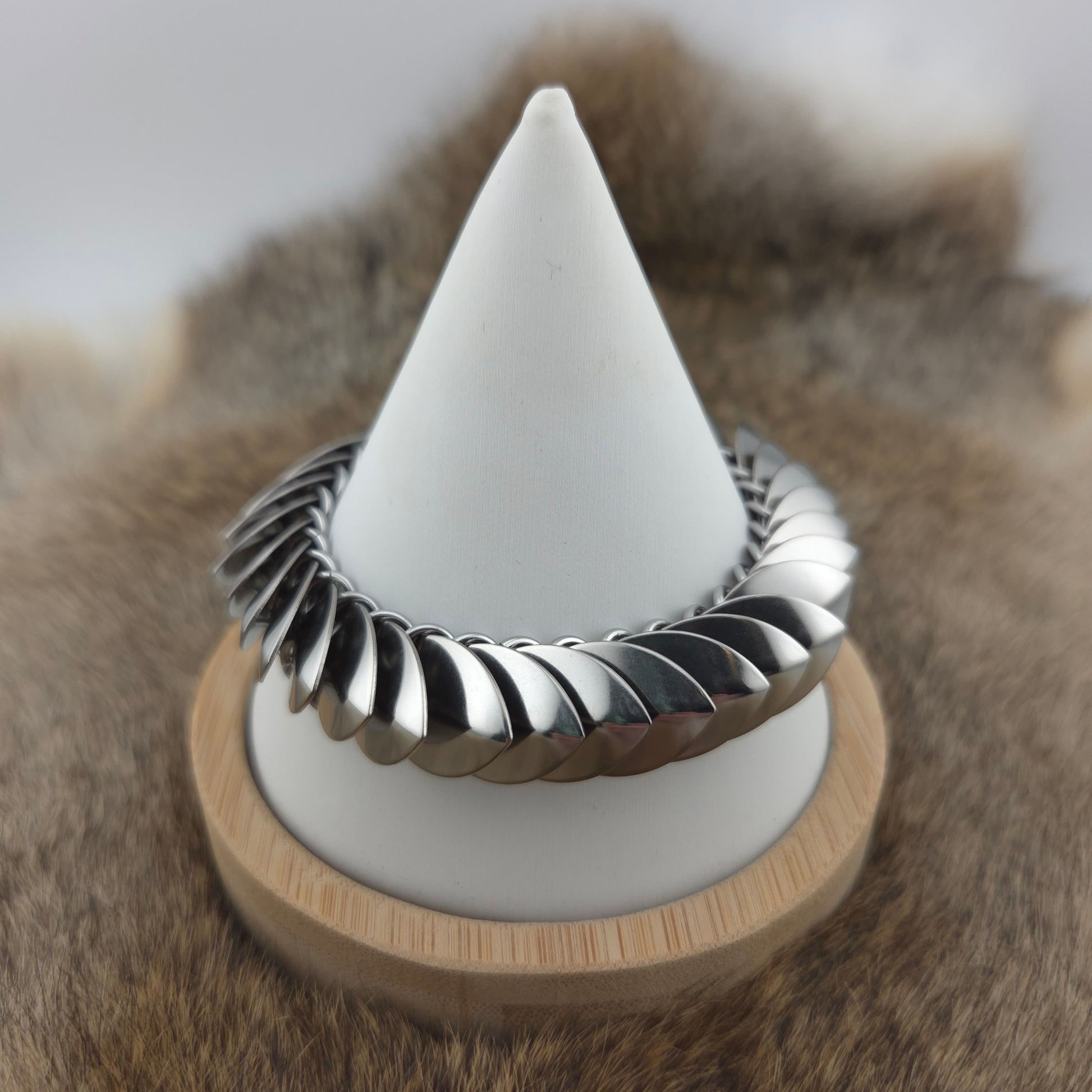 Stainless steel Dragon Scale Bracelet, with a stainless steel spine, stainless steel scales, and a solid stainless steel spring clasp shaped as a Dragon head.