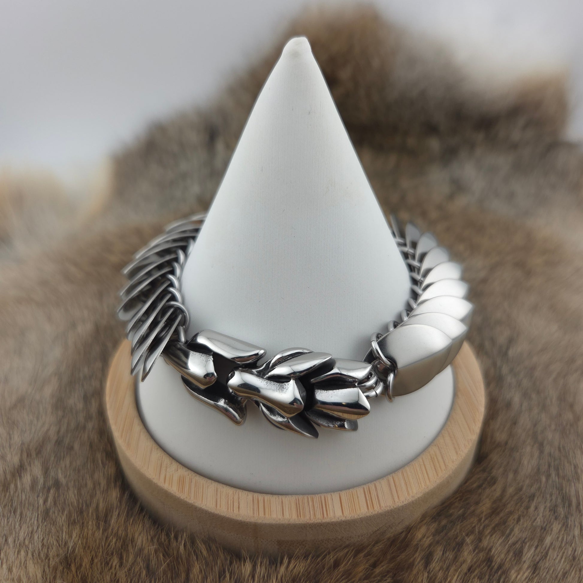 Stainless steel Dragon Scale Bracelet, with a stainless steel spine, stainless steel scales, and a solid stainless steel spring clasp shaped as a Dragon head.